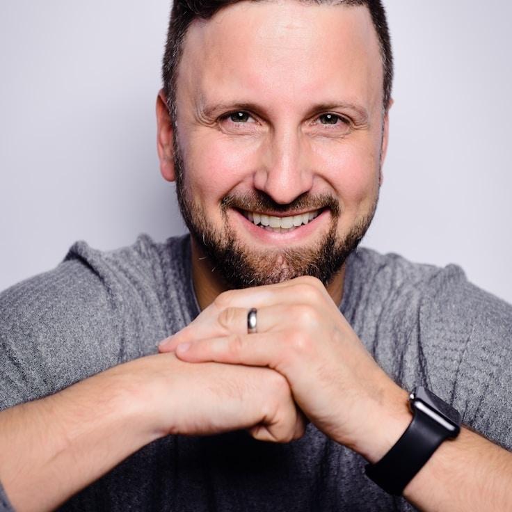 Amina Rao, Lead Design Curator at SimpleGaugeAnchor, reviewing corporate floral arrangements